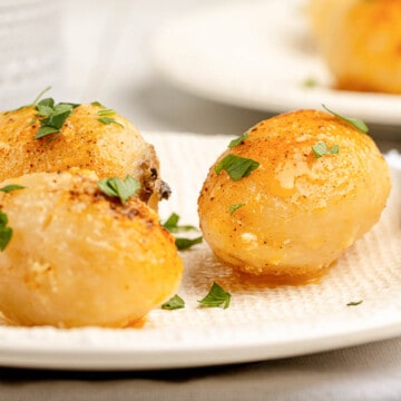Golden potatoes on a plate.