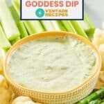 A bowl of green goddess dip and veggies on a platter.