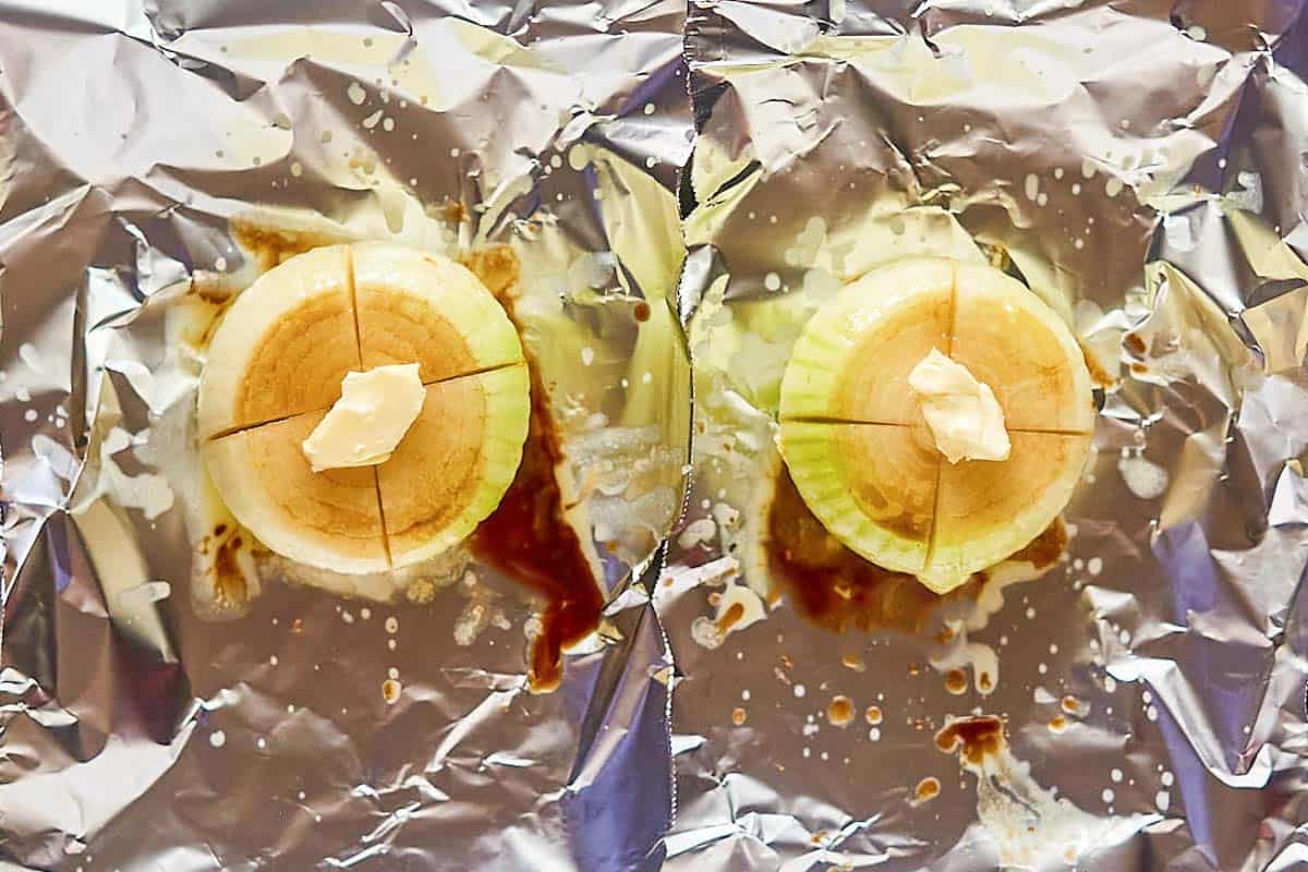 Cut sweet onions on foil with Worcestershire sauce and button on top.