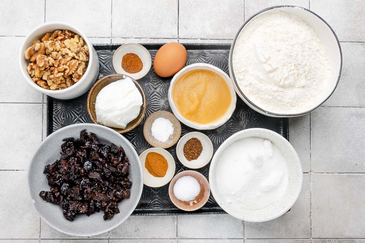 Prune cake ingredients on a tray.