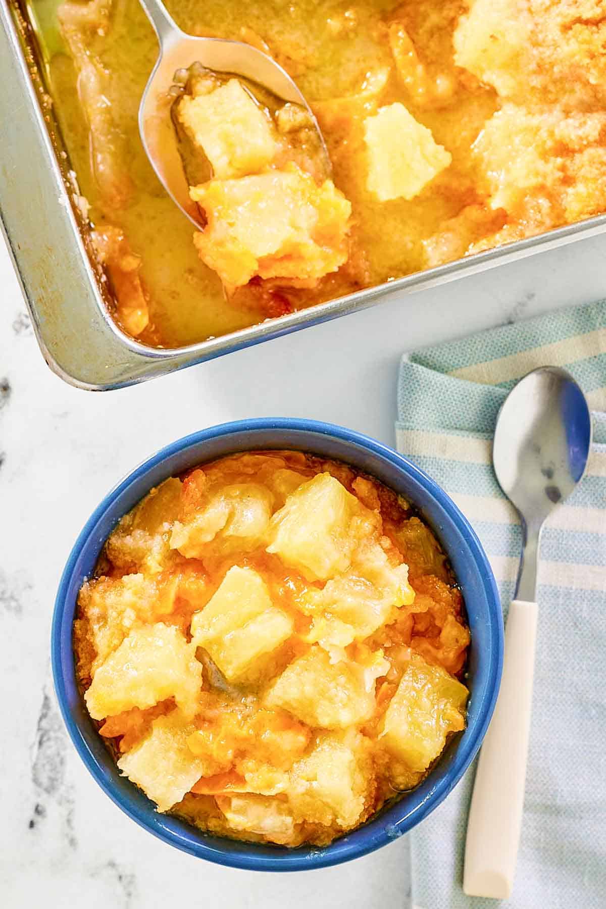 Pineapple cheese casserole in a baking dish and bowl.