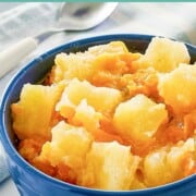 Pineapple cheese casserole serving in a small bowl.