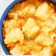 A bowl of pineapple cheese casserole.