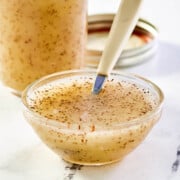 Homemade celery seed dressing in a small bowl.