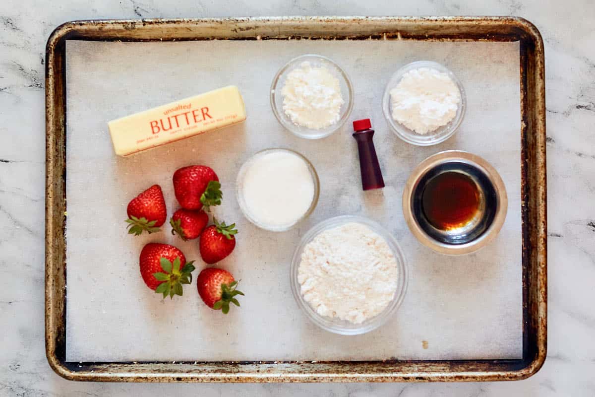 Old fashioned strawberry pie ingredients on a tray.