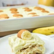 A serving of sour cream banana pudding on a plate.